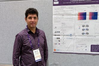 Alfonso presenting poster